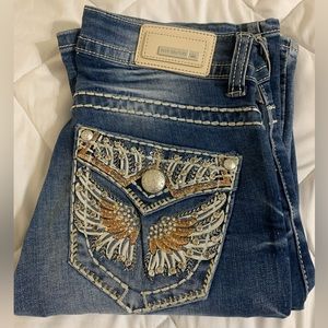 Rhinestone pocket Sexy couture bootcut jeans!!